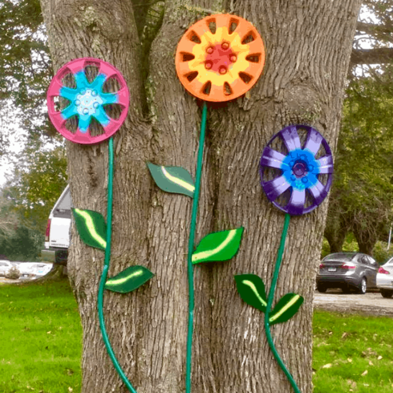 DIY painted hubcap flowers