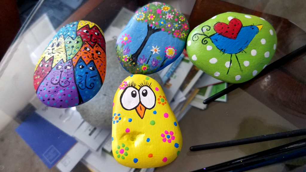how to paint rocks. Bird, cat and tree.